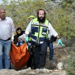 Israeli volunteers return with the body of Kristine Luken.
