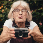 Old woman having fun