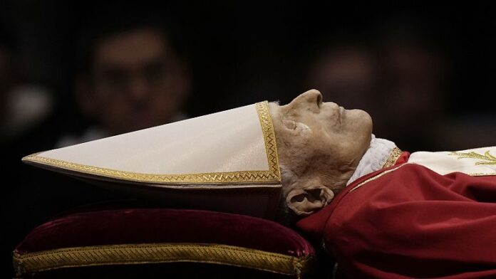 Pope Benedict laid to rest
